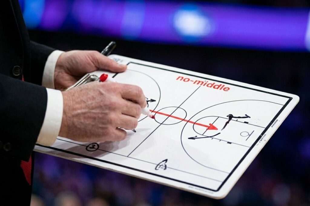 Unpacking March Madness History: Texas Tech Vs Florida Key Stats & Records Close-up intense physical play during texas tech vs florida basketball history matchup